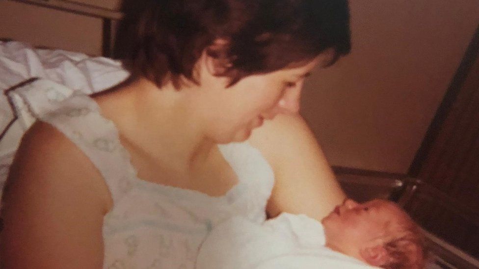 Barbara Palmer holding baby Lauren Palmer