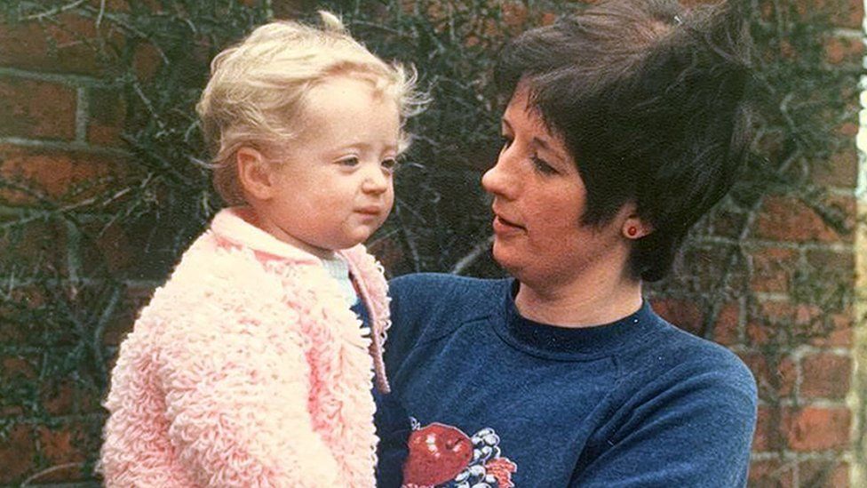 Barbara Palmer holding baby Lauren Palmer