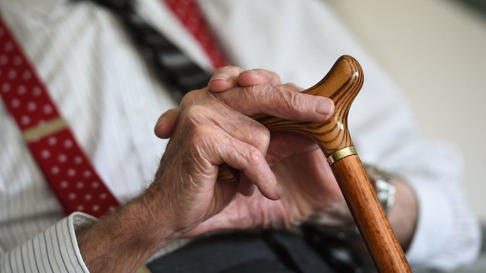 An elderly man at a retirement home