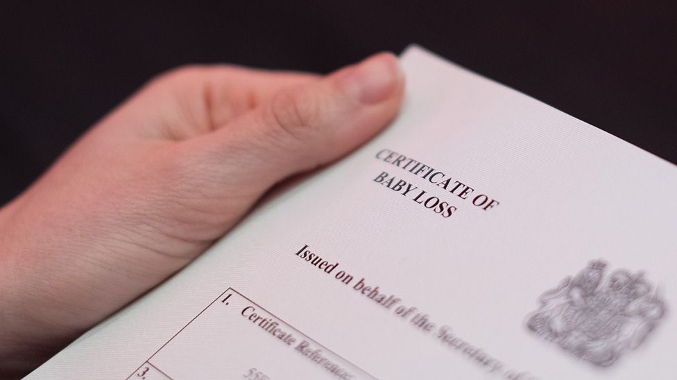 Emma Barnett holds the baby loss certificate she applied for