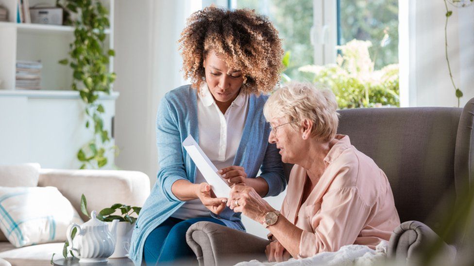 A carer with a patient