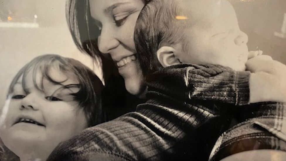 Lainee aged two with her mother Claire and baby sibling