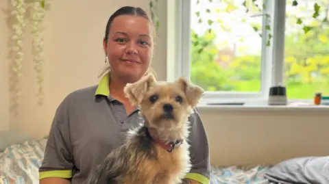 Qays Najm/BBC Chloe and her dog Teddy