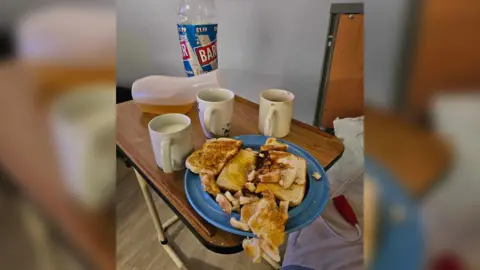 A urine bottle stored on a person's breakfast table at a Liverpool care home