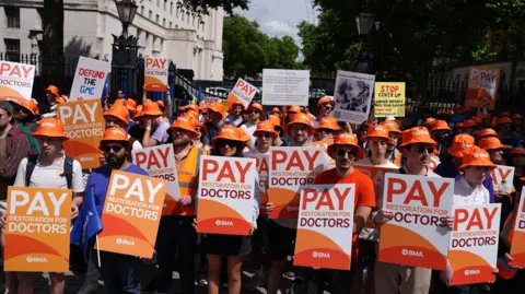 PA Junior doctors protesting opposite Downing Street, London. 