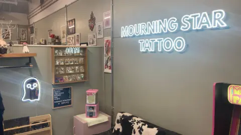 The inside of Mourning Star Tattoo in Newport Market 