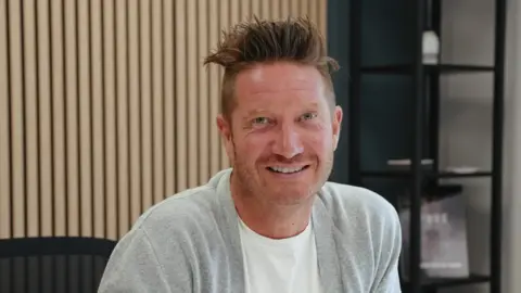 IND!E Matthew Hopkins, founder of IND!E, with spiky hair