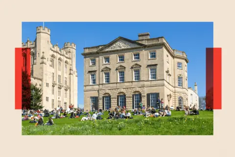 Geography Images via Getty Images An image of students in Bristol, socialising on a grass lawn