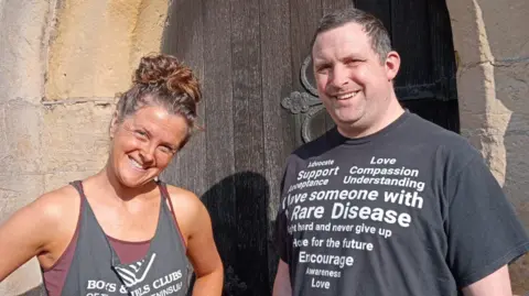 Charlotte Chapman-Hart Chalotte with her brother Tim who is wearing a T Shirt in support of people with rare diseases. 