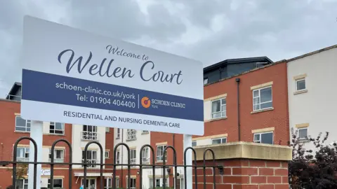 BBC/Ben Cryer A sign outside a dementia care home