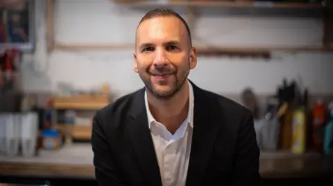 PA Media Zack Polanski at United Voice of the World in London after being announced as the new leader of the Green Party. 