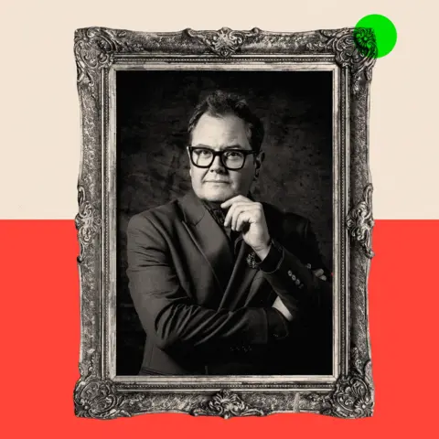 BBC A treated image of Alan Carr posing in a framed portrait 