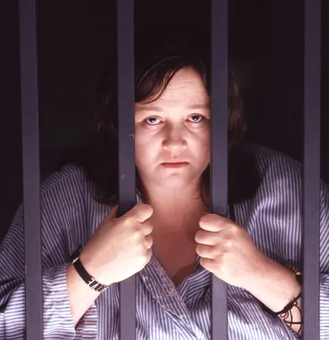 Image of Pauline Quirk behind bars in The Sculptress